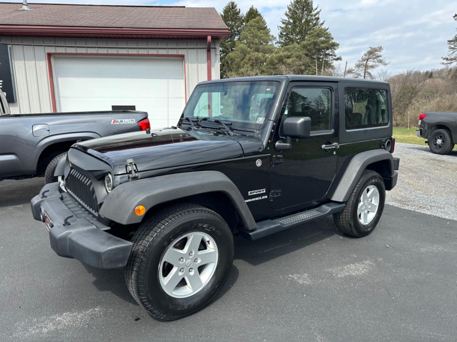 2015 Black Jeep Wrangler (1C4GJWAGXFL) with an 6 engine, automatic transmission, located at 8464 Route 219, Brockway, PA, 15824, (814) 265-1330, 41.226871, -78.780518 - Great price on this pre owned 2015 Jeep Wrangler Sport 2dr with V6, automatic, air condition, hard top, and much more. This Jeep suv is serviced and ready to go. - Photo #0